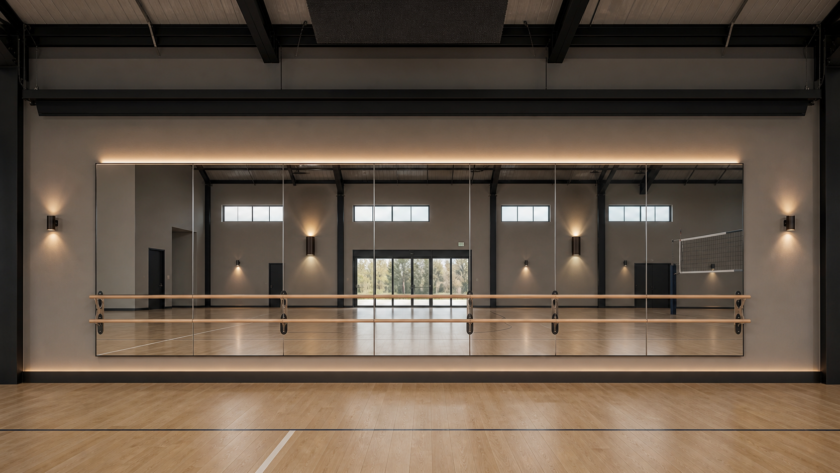 AI-rendered elevation of the 35-foot north gym ballet/movement wall — 7 recessed dance-studio-quality mirror panels in a centered 28-foot mirror field with double white-oak ballet barres at standard heights, three sconces in the solid edge zones plus two embedded mirror sconces, low-profile dark-charcoal retracted protective-net housing at the upper edge
