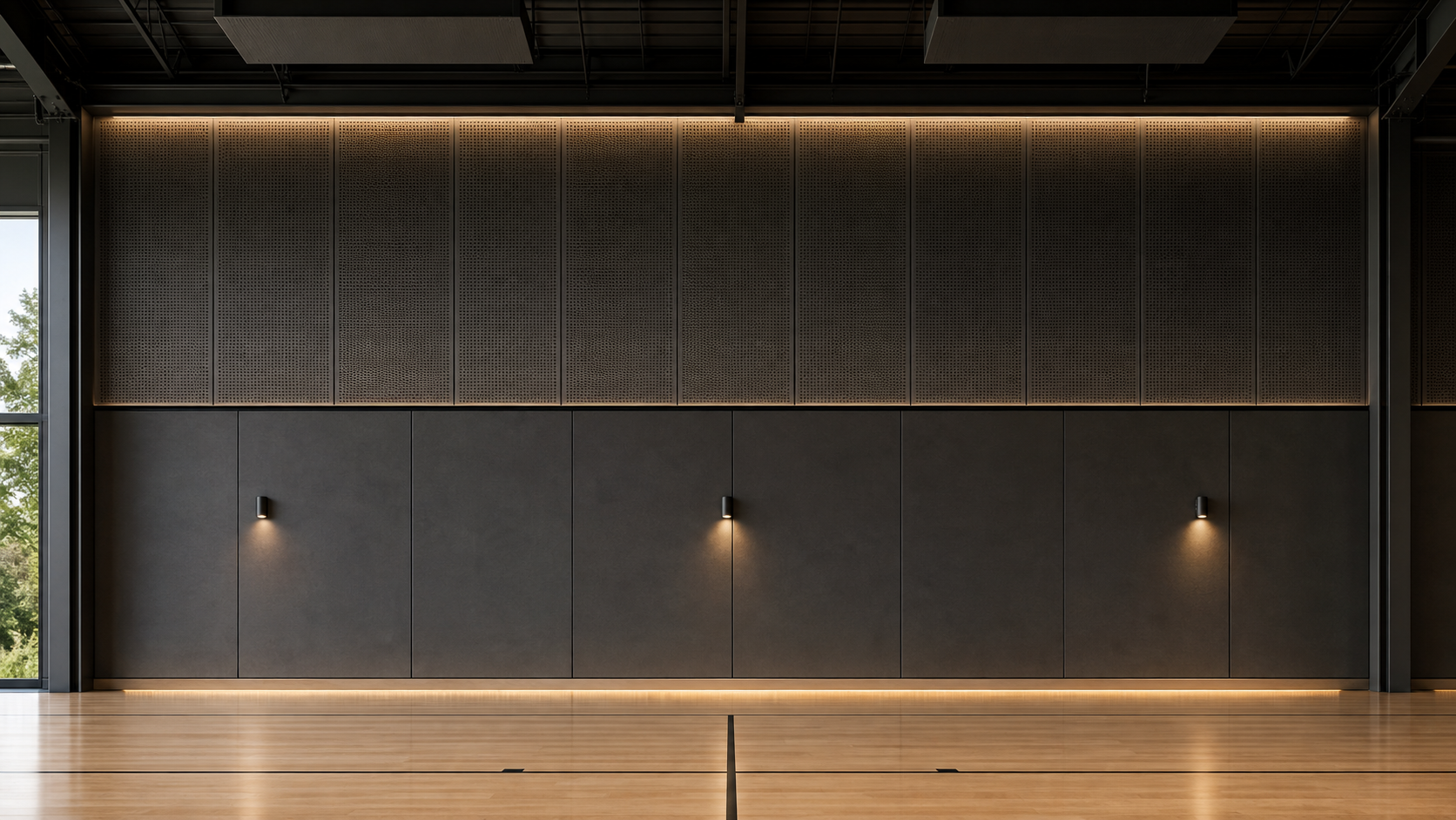 AI-rendered elevation of the 35-foot south gym rebound + acoustic wall — soft-charcoal plywood-based impact panels below the 16-foot AFF shadow-gap datum, dark-charcoal microperf-faced mineral-wool acoustic field above, three dark-bronze sconces at human-scale datum, upper indirect linear wash and low-level indirect glow