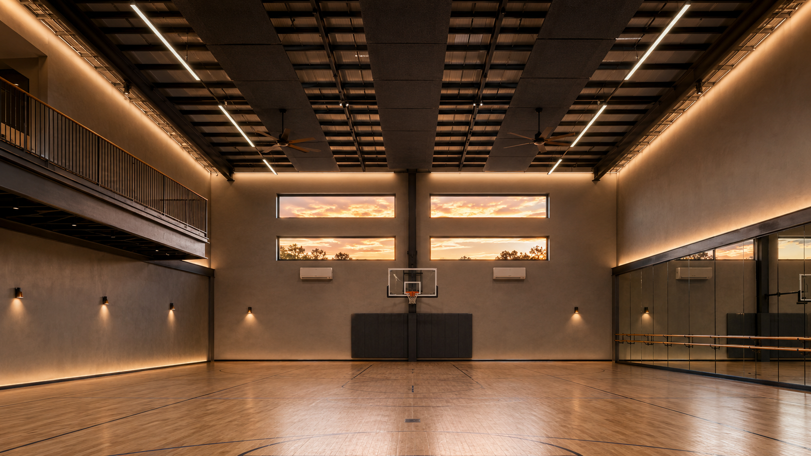 AI-rendered architectural visualization of the gym Great Hall — interior wide view looking west, central PEMB column flanked by four clerestory windows glowing with sunset light, suspended acoustic cloud panels and four low-profile destratification fans overhead, ballet wall mirrors to the right, rebound wall to the left, overlook balcony in foreground